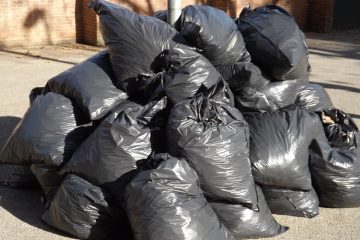 A pile of black garbage bags