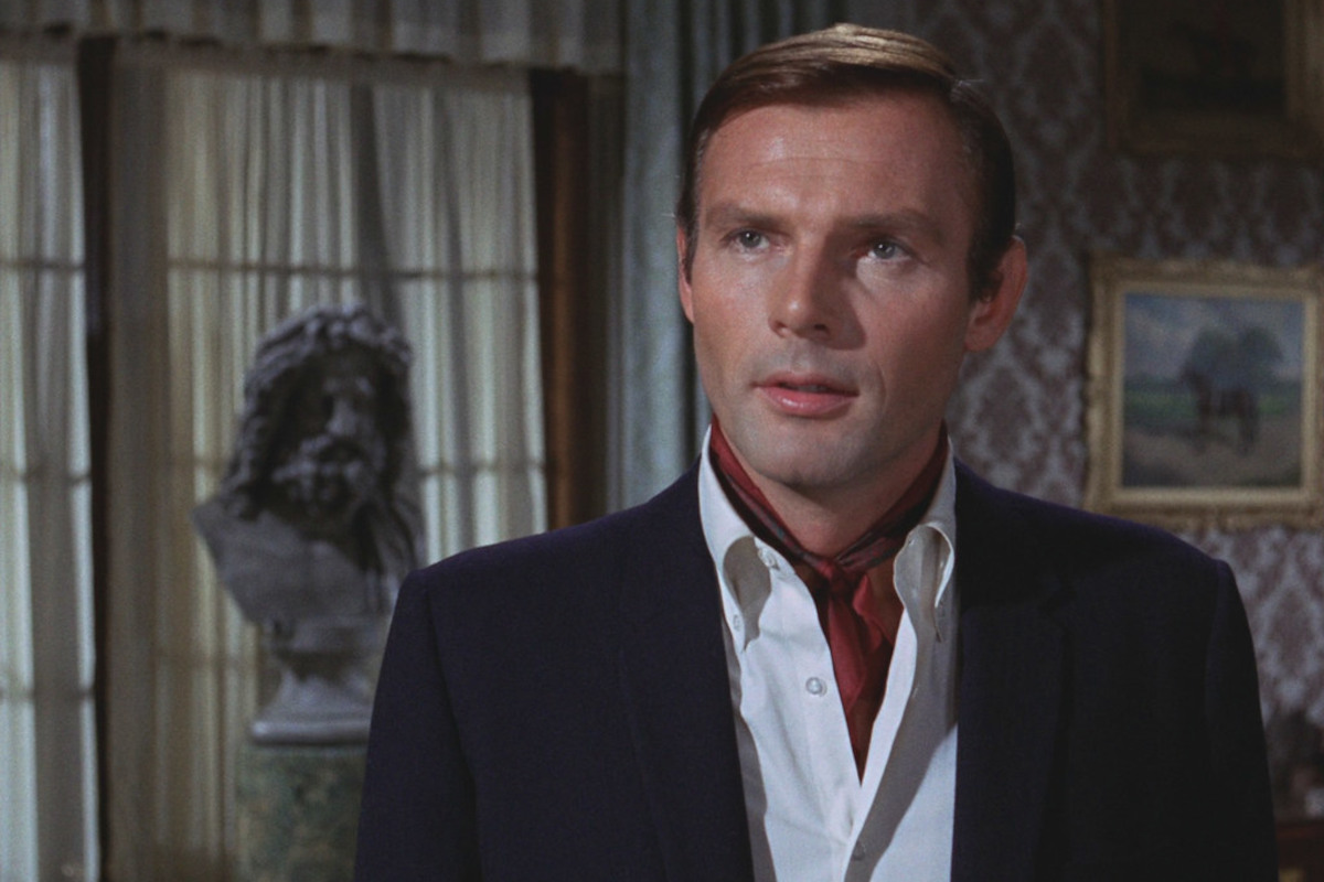 Adam West as Bruce Wayne