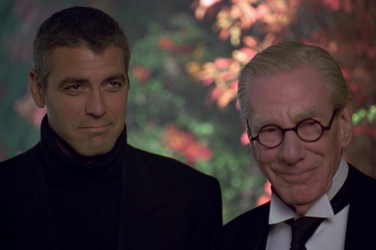 George Clooney (left) as Bruce Wayne and Michael Gough (right) as Alfred Pennyworth
