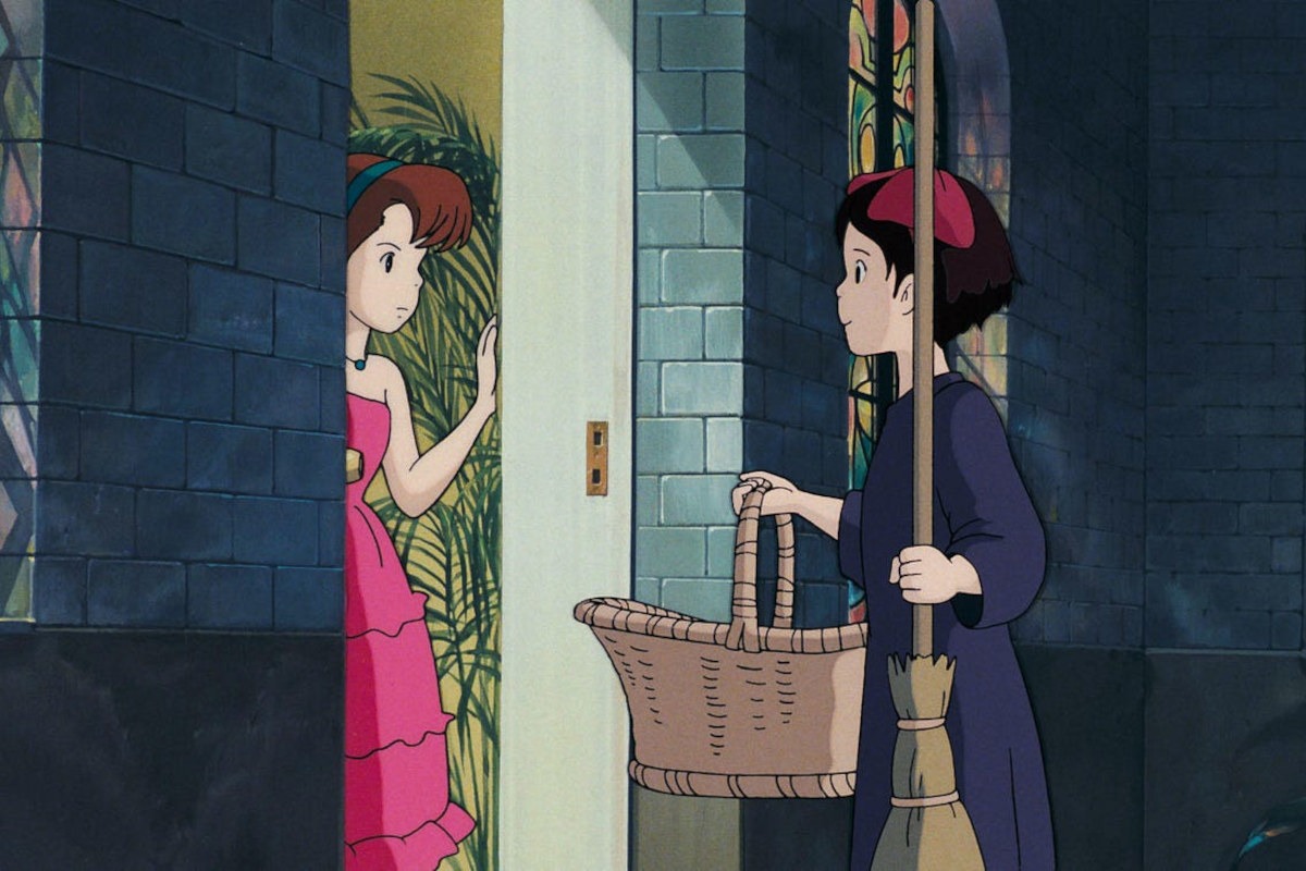 Kiki delivering a pie to a customer